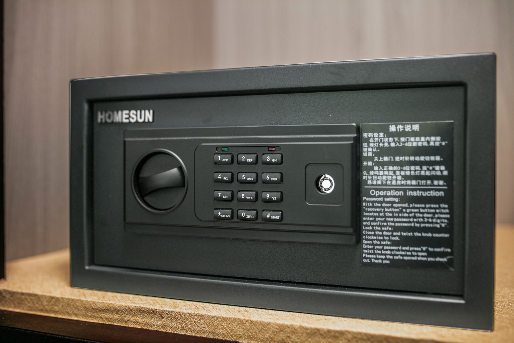 Digital cabin safe with a keypad and operating instructions on Hermes Premium