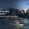 Hermes Premium sailing a calm channel between limestone islands, illustrating whether a Halong Bay cruise is safe