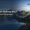 Aerial view of a cruise ship among limestone islands in Halong Bay with the guide title